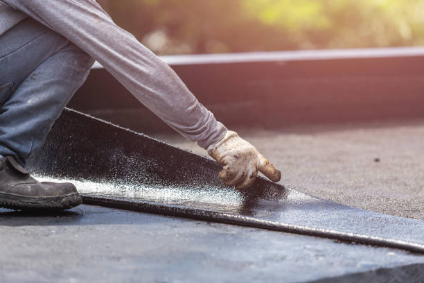 Professional Basement Waterproofing technician working in Weston, MI